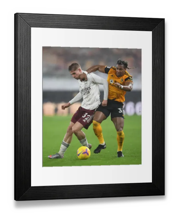 Framed Print : Emile Smith Rowe vs Adama Traore: Intense Battle at Wolverhampton Wanderers vs Arsenal, Premier League 2020-21