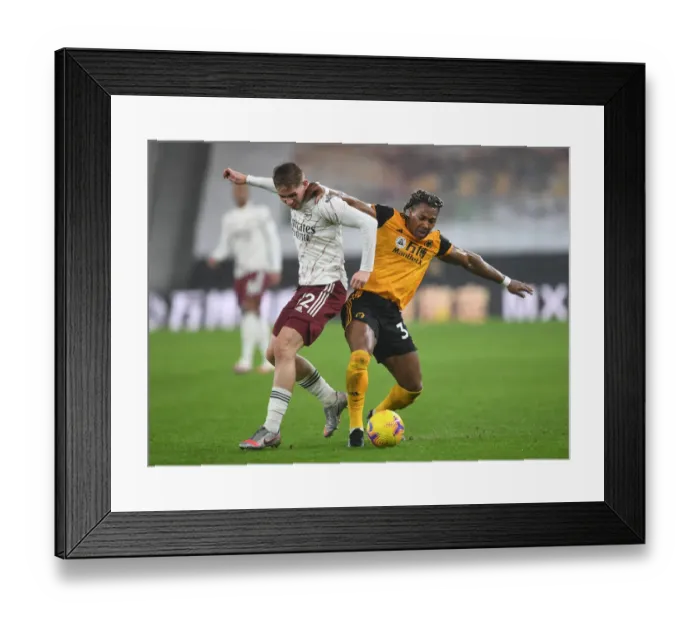 Framed Print : Intense Rivalry: Emile Smith Rowe vs Adama Traore - A Battle at the Heart of Wolverhampton Wanderers vs Arsenal, Premier League 2020-21