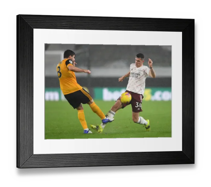 Framed Print : Xhaka vs. Neves: Battle in the Midfield - Wolverhampton Wanderers vs. Arsenal, Premier League 2020-21