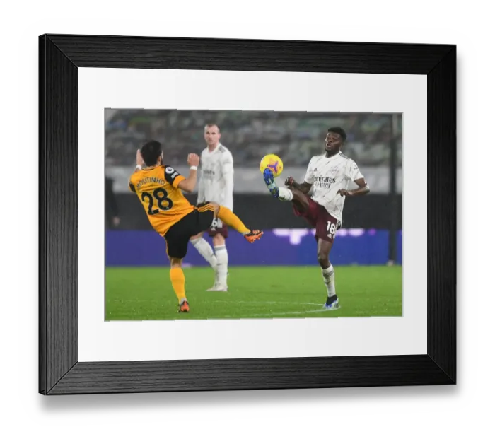 Framed Print : Thomas Partey vs. Joao Moutinho: Intense Battle in Wolverhampton Wanderers vs. Arsenal Premier League Clash Framed Print : Thomas Partey vs. Joao Moutinho: Intense Battle in Wolverhampton Wanderers vs. Arsenal Premier League Clash