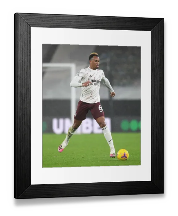Framed Print : Gabriel Magalhaes Unyielding Spirit: Arsenal's Fight Against Wolverhampton Wanderers in the Premier League 2020-21