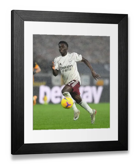 Framed Print : Bukayo Saka: Arsenal Star Shines in Premier League Clash Against Wolverhampton Wanderers