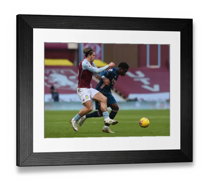 Framed Print : Saka vs Grealish: A Premier League Face-Off at Villa Park Framed Print : Saka vs Grealish: A Premier League Face-Off at Villa Park