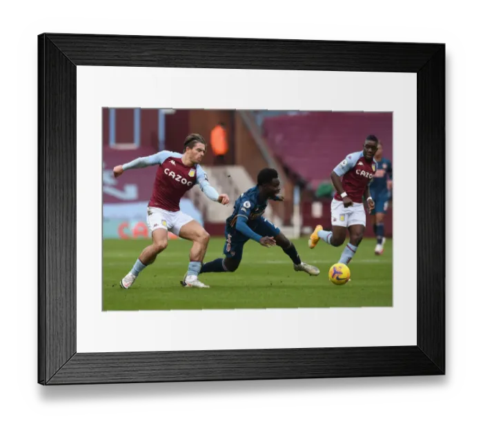 Framed Print : Saka vs Grealish: A Premier League Battle at Villa Park Framed Print : Saka vs Grealish: A Premier League Battle at Villa Park
