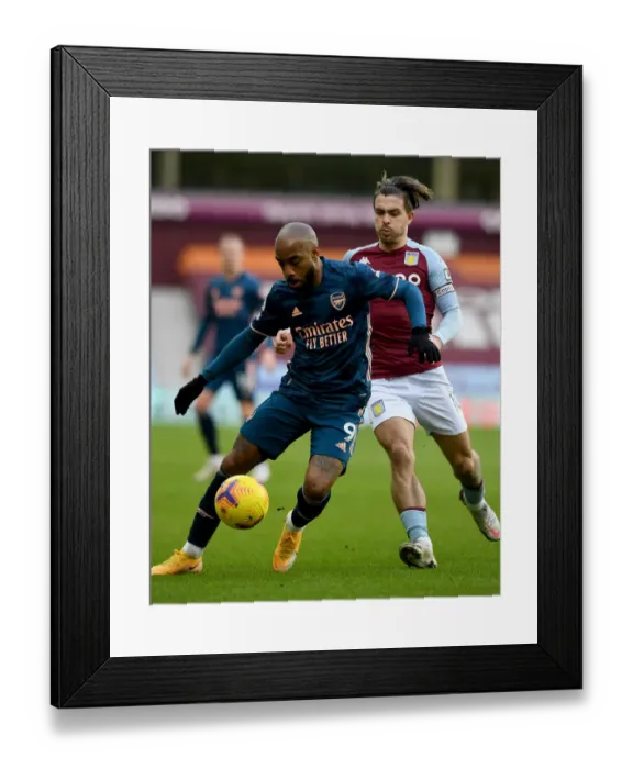 Framed Print : Clash at Villa Park: Lacazette vs. Grealish in Premier League Showdown Framed Print : Clash at Villa Park: Lacazette vs. Grealish in Premier League Showdown