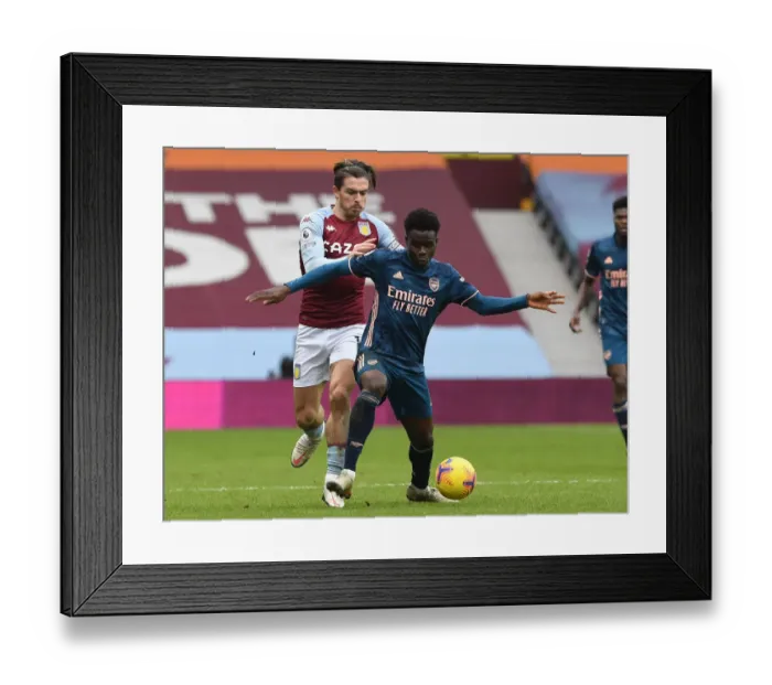 Framed Print : Bukayo Saka vs Jack Grealish: Intense Battle at Villa Park - Aston Villa vs Arsenal, Premier League 2020-21 Framed Print : Bukayo Saka vs Jack Grealish: Intense Battle at Villa Park - Aston Villa vs Arsenal, Premier League 2020-21