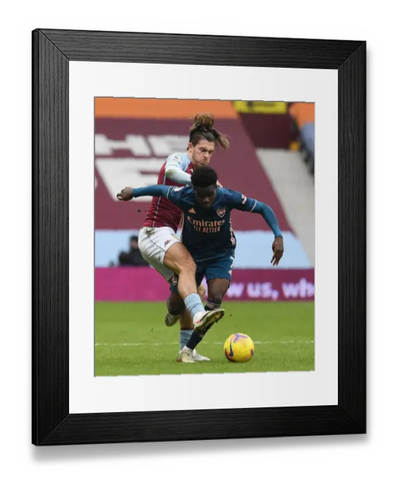 Framed Print : Saka vs Grealish: A Premier League Showdown at Villa Park Framed Print : Saka vs Grealish: A Premier League Showdown at Villa Park