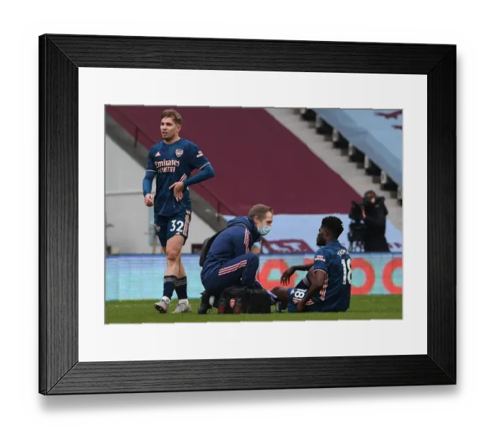 Framed Print : Thomas Partey Receives Treatment: Aston Villa vs. Arsenal, Premier League 2020-21 Framed Print : Thomas Partey Receives Treatment: Aston Villa vs. Arsenal, Premier League 2020-21