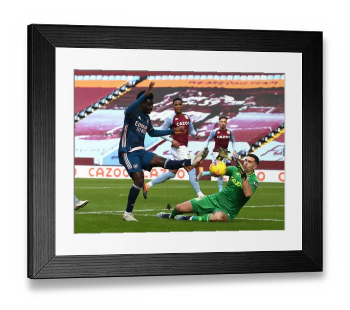 Framed Print : Saka vs Martinez: Intense Battle in Aston Villa vs Arsenal Premier League Clash