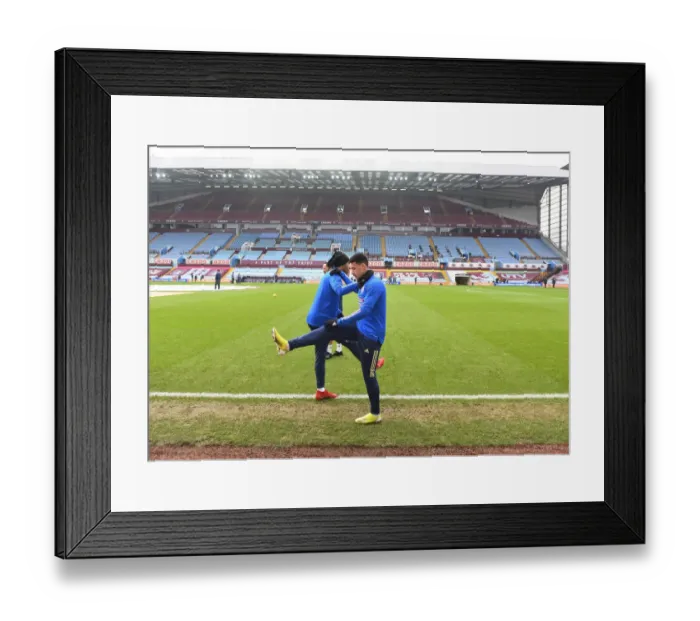 Framed Print : Arsenal Players Pierre-Emerick Aubameyang and Gabriel Martinelli Before Aston Villa vs Arsenal, Premier League 2021 (Behind Closed Doors)