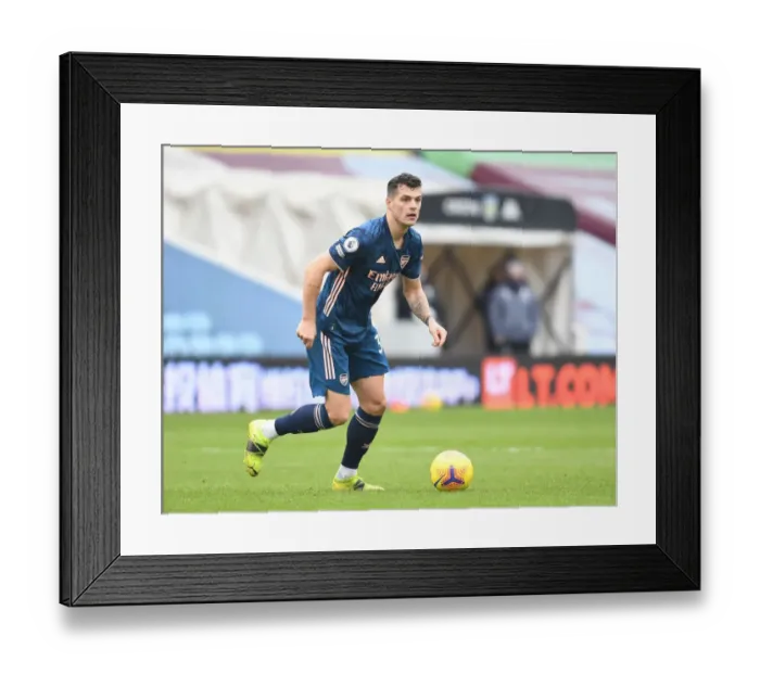 Framed Print : Arsenal's Granit Xhaka in Action at Empty Villa Park: Aston Villa vs Arsenal, Premier League 2021 Framed Print : Arsenal's Granit Xhaka in Action at Empty Villa Park: Aston Villa vs Arsenal, Premier League 2021