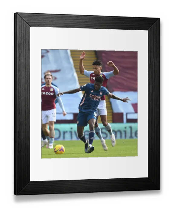 Framed Print : Thomas Partey vs. Ollie Watkins: A Battle at Villa Park in Empty Premier League Stadiums (Aston Villa v Arsenal, 2021) Framed Print : Thomas Partey vs. Ollie Watkins: A Battle at Villa Park in Empty Premier League Stadiums (Aston Villa v Arsenal, 2021)