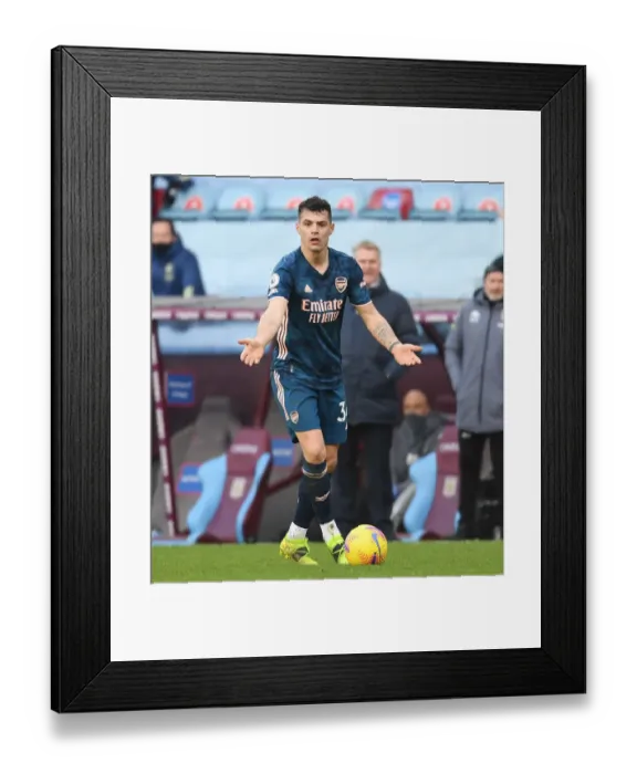 Framed Print : Granit Xhaka: Empty Villa Park Showdown - Arsenal vs. Aston Villa, Premier League 2021 Framed Print : Granit Xhaka: Empty Villa Park Showdown - Arsenal vs. Aston Villa, Premier League 2021