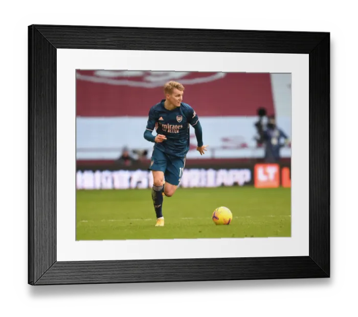 Framed Print : Arsenal's Martin Odegaard Plays in Empty Villa Park: Premier League 2021 (Aston Villa vs Arsenal) Framed Print : Arsenal's Martin Odegaard Plays in Empty Villa Park: Premier League 2021 (Aston Villa vs Arsenal)