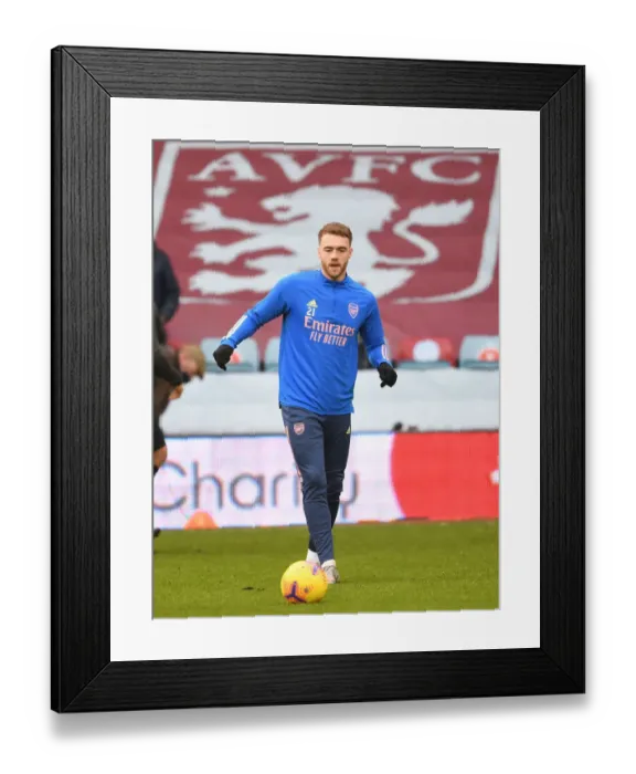 Framed Print : Arsenal's Calum Chambers at Empty Villa Park: Aston Villa vs Arsenal, Premier League 2021