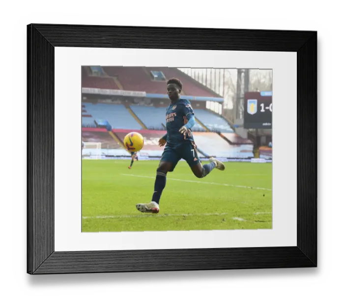 Framed Print : Bukayo Saka's Brilliant Performance at Empty Villa Park: Arsenal's Premier League Victory Amidst COVID-19 Restrictions Framed Print : Bukayo Saka's Brilliant Performance at Empty Villa Park: Arsenal's Premier League Victory Amidst COVID-19 Restrictions