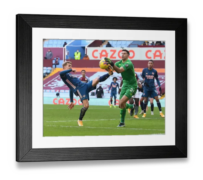 Framed Print : Arsenal's Odegaard Thwarted by Villa's Martinez: Aston Villa vs Arsenal, Premier League 2021