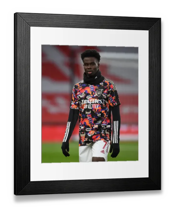 Framed Print : Arsenal's Bukayo Saka Gears Up for Arsenal v Leeds United Clash in Premier League