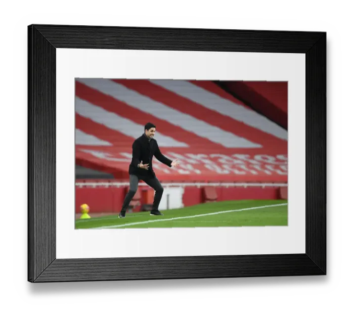 Framed Print : Mikel Arteta Leads Arsenal in Premier League Battle Against Leeds United