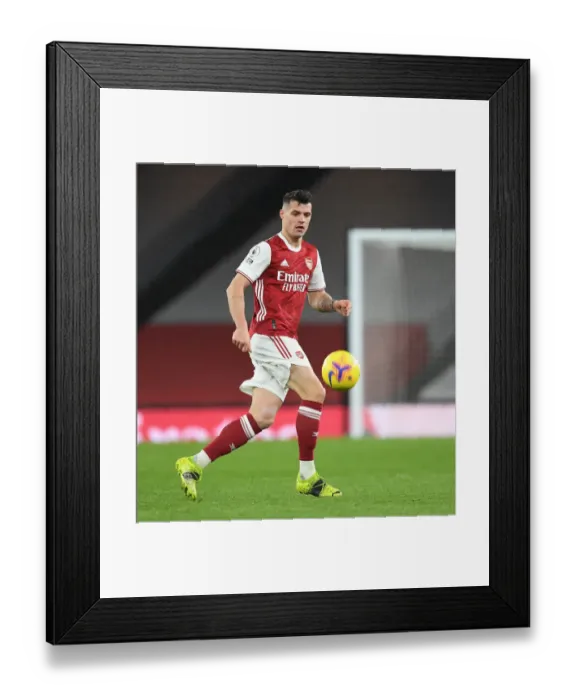 Framed Print : Granit Xhaka in Action: Arsenal vs Leeds United, Premier League 2020-21 Framed Print : Granit Xhaka in Action: Arsenal vs Leeds United, Premier League 2020-21