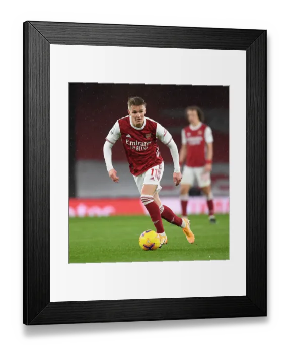 Framed Print : Martin Odegaard's Brilliant Display: Arsenal Dominates Leeds United in Premier League Clash Framed Print : Martin Odegaard's Brilliant Display: Arsenal Dominates Leeds United in Premier League Clash