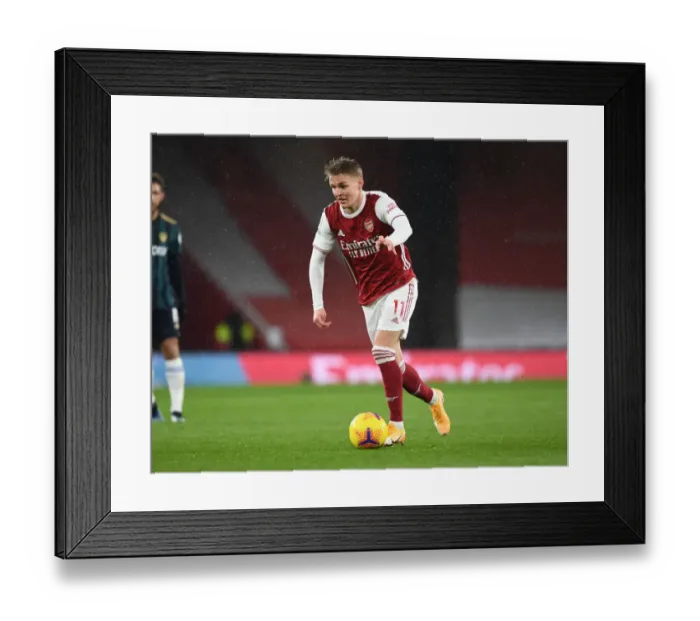 Framed Print : Arsenal's Martin Odegaard Shines in Premier League Clash Against Leeds United Framed Print : Arsenal's Martin Odegaard Shines in Premier League Clash Against Leeds United