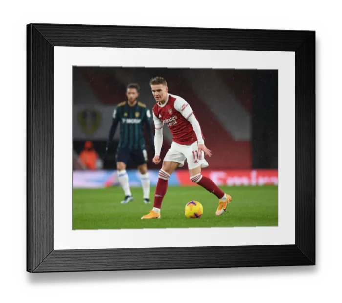 Framed Print : Martin Odegaard's Brilliant Performance: Arsenal's Commanding Victory Over Leeds United Framed Print : Martin Odegaard's Brilliant Performance: Arsenal's Commanding Victory Over Leeds United