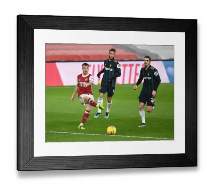 Framed Print : Arsenal vs Leeds United: Granit Xhaka vs Pascal Struijk Battle in the Premier League Framed Print : Arsenal vs Leeds United: Granit Xhaka vs Pascal Struijk Battle in the Premier League