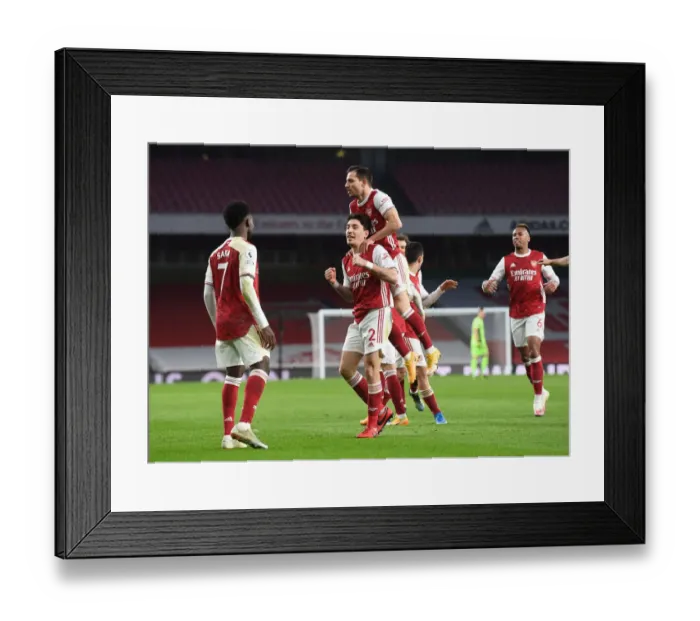 Framed Print : Arsenal's Bellerin, Saka, and Cedric Celebrate Goals Against Leeds United in 2021 Premier League Match Framed Print : Arsenal's Bellerin, Saka, and Cedric Celebrate Goals Against Leeds United in 2021 Premier League Match