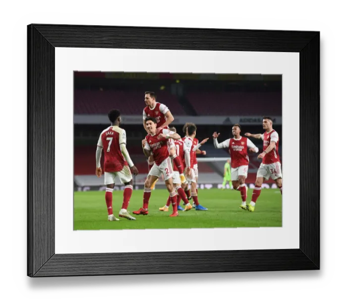 Framed Print : Arsenal's Bellerin, Saka, and Cedric: Celebrating a Triumphant Three-Goal Spree Against Leeds United in the Premier League, 2021