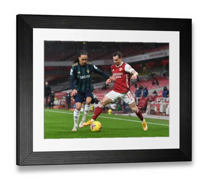 Framed Print : Arsenal vs Leeds United: A Premier League Battle - Cedric vs Costa Clash Framed Print : Arsenal vs Leeds United: A Premier League Battle - Cedric vs Costa Clash