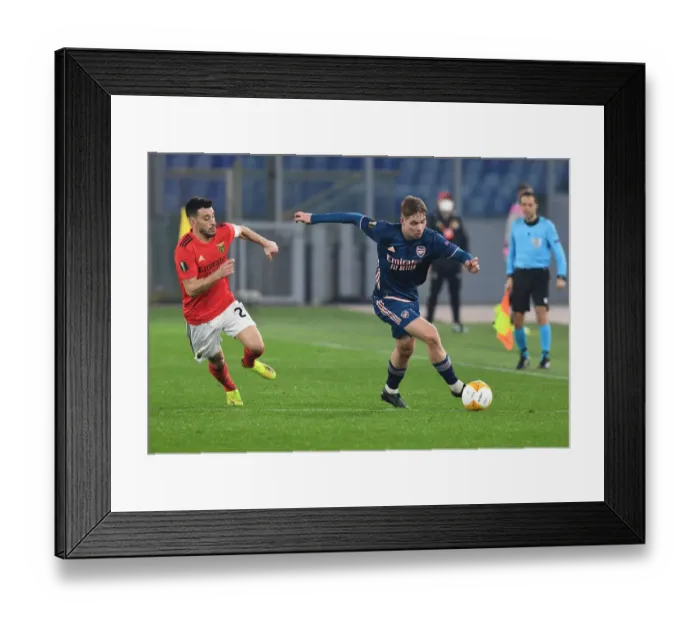 Framed Print : Arsenal's Emile Smith Rowe Clashes with Benfica's Silva in Europa League Showdown Framed Print : Arsenal's Emile Smith Rowe Clashes with Benfica's Silva in Europa League Showdown