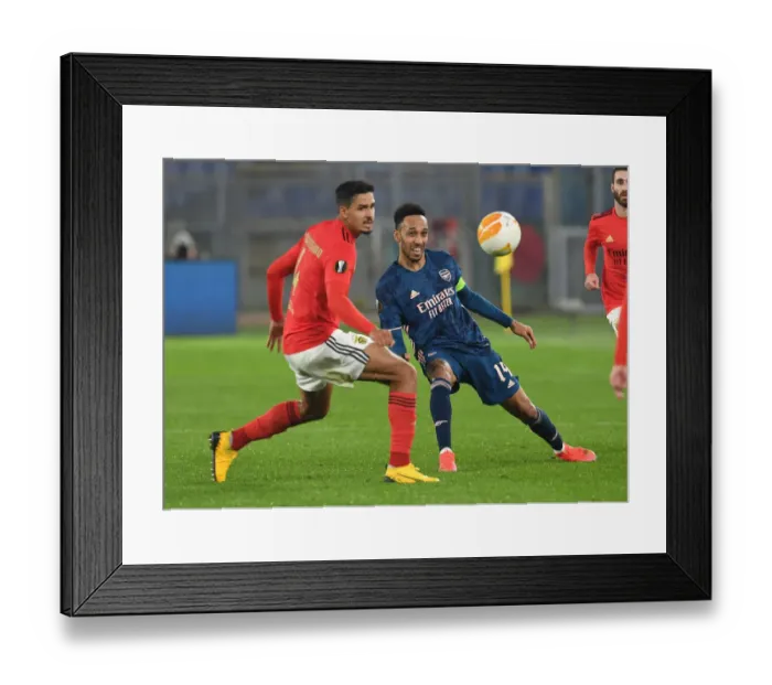 Framed Print : Arsenal's Aubameyang Clashes with Benfica's Verissimo in Europa League Showdown Framed Print : Arsenal's Aubameyang Clashes with Benfica's Verissimo in Europa League Showdown