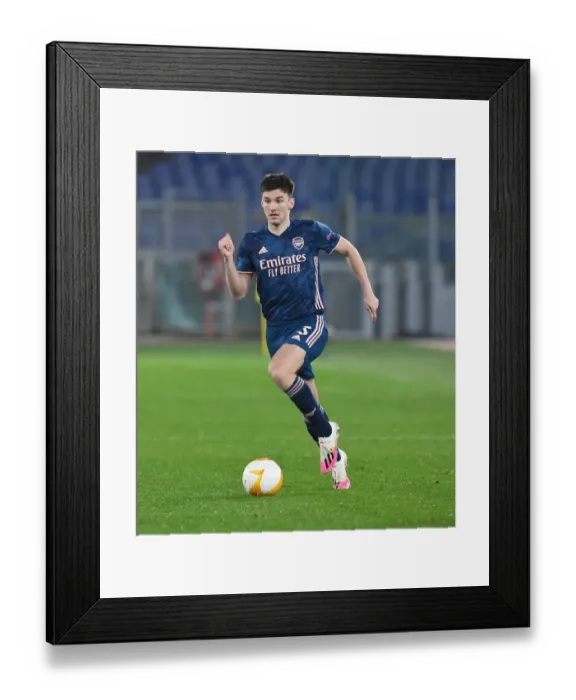 Framed Print : Arsenal's Kieran Tierney in Action at UEFA Europa League: Arsenal vs SL Benfica
