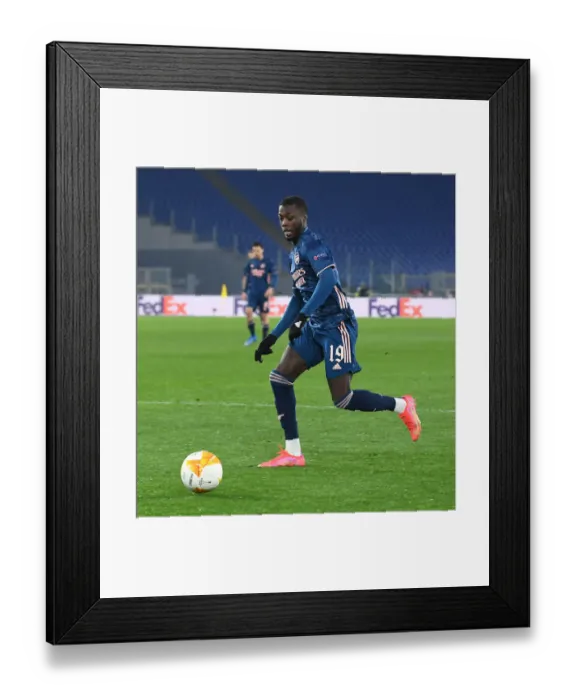 Framed Print : Arsenal's Nicolas Pepe in Action against SL Benfica in UEFA Europa League Round of 32, Rome
