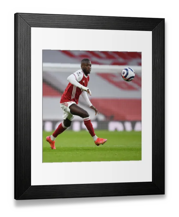 Framed Print : Behind Closed Doors: Pepe's Emirates Showdown - Arsenal vs Manchester City, 2021-22 Premier League Framed Print : Behind Closed Doors: Pepe's Emirates Showdown - Arsenal vs Manchester City, 2021-22 Premier League