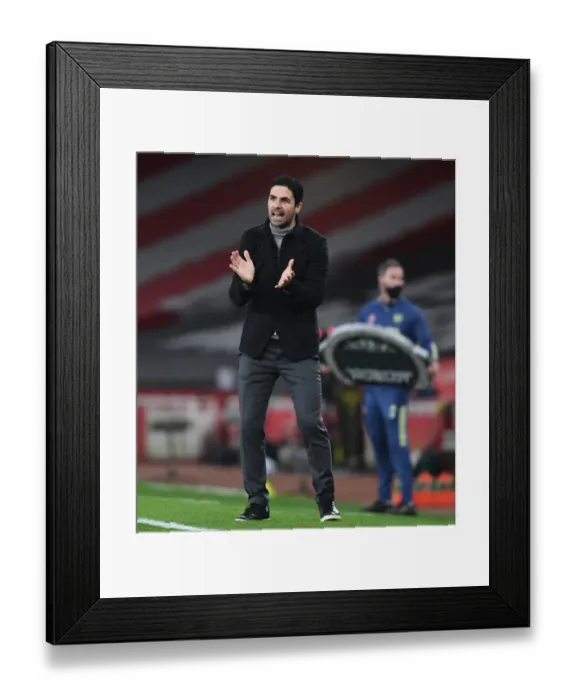 Framed Print : Mikel Arteta Alone: Arsenal's Empty Emirates Battle Against Manchester City, Premier League 2021