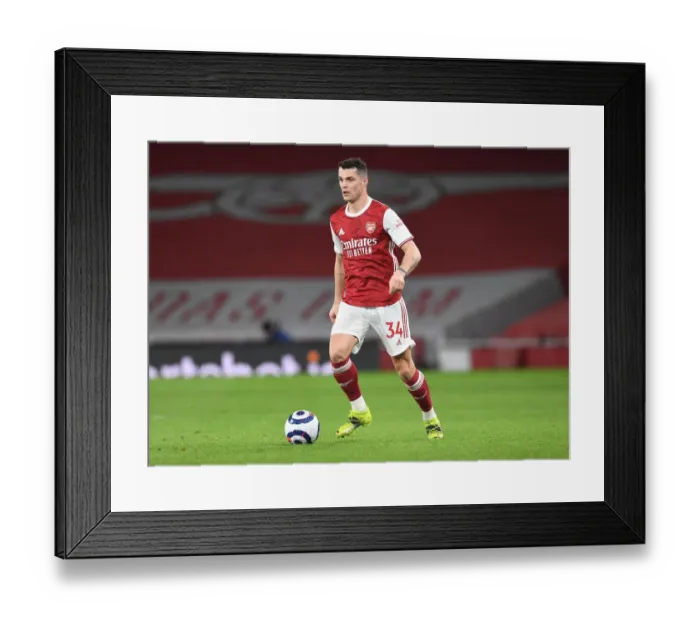 Framed Print : Arsenal's Granit Xhaka in Action Against Manchester City: 2020-21 Premier League (Behind Closed Doors) Framed Print : Arsenal's Granit Xhaka in Action Against Manchester City: 2020-21 Premier League (Behind Closed Doors)