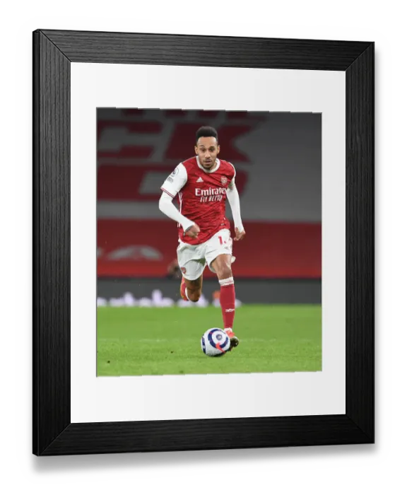 Framed Print : Arsenal's Aubameyang Faces Manchester City in Empty Emirates Stadium - Premier League 2021 Framed Print : Arsenal's Aubameyang Faces Manchester City in Empty Emirates Stadium - Premier League 2021