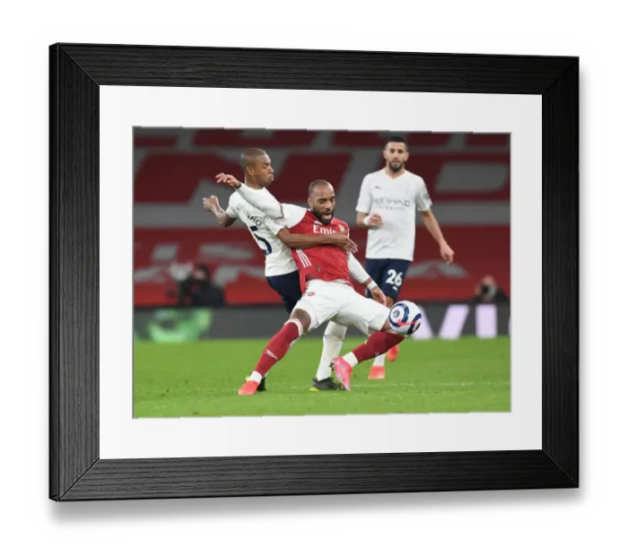 Framed Print : Premier League Showdown: Lacazette vs Fernandinho in Empty Emirates Stadium - Arsenal vs Manchester City (February 2021)