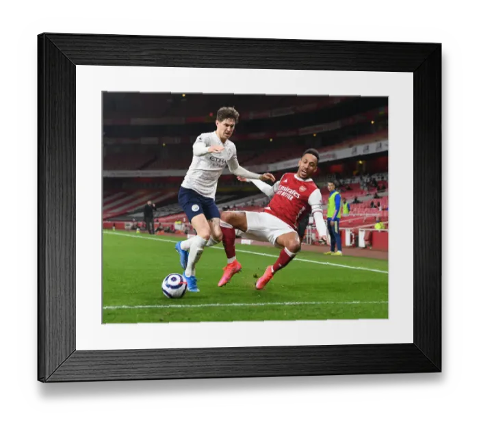 Framed Print : Arsenal vs Manchester City: Aubameyang vs Stones - Premier League Clash in Empty Emirates Amidst Coronavirus Restrictions Framed Print : Arsenal vs Manchester City: Aubameyang vs Stones - Premier League Clash in Empty Emirates Amidst Coronavirus Restrictions