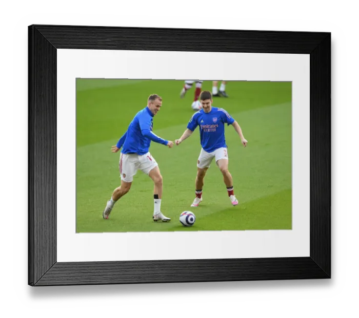 Framed Print : Arsenal Players Kieran Tierney and Rob Holding Warm Up Ahead of Emirates Showdown: Arsenal vs Manchester City (Behind Closed Doors), 2021 Framed Print : Arsenal Players Kieran Tierney and Rob Holding Warm Up Ahead of Emirates Showdown: Arsenal vs Manchester City (Behind Closed Doors), 2021