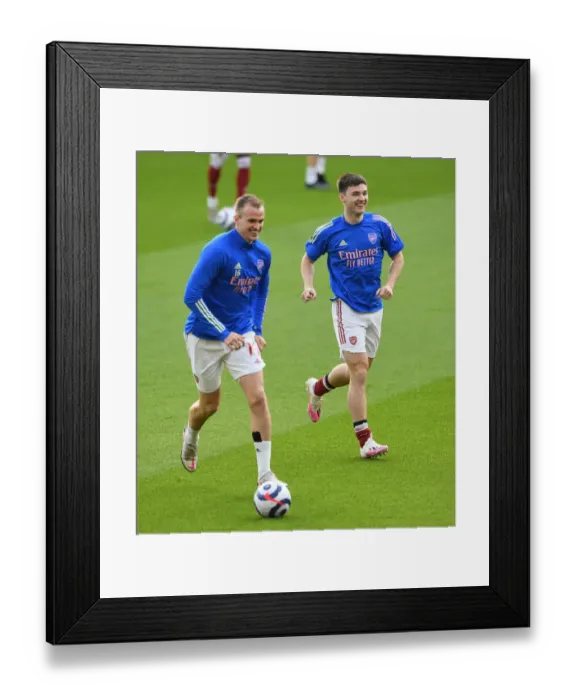 Framed Print : Arsenal's Tierney and Holding Gear Up for Empty Emirates Showdown Against Manchester City Framed Print : Arsenal's Tierney and Holding Gear Up for Empty Emirates Showdown Against Manchester City