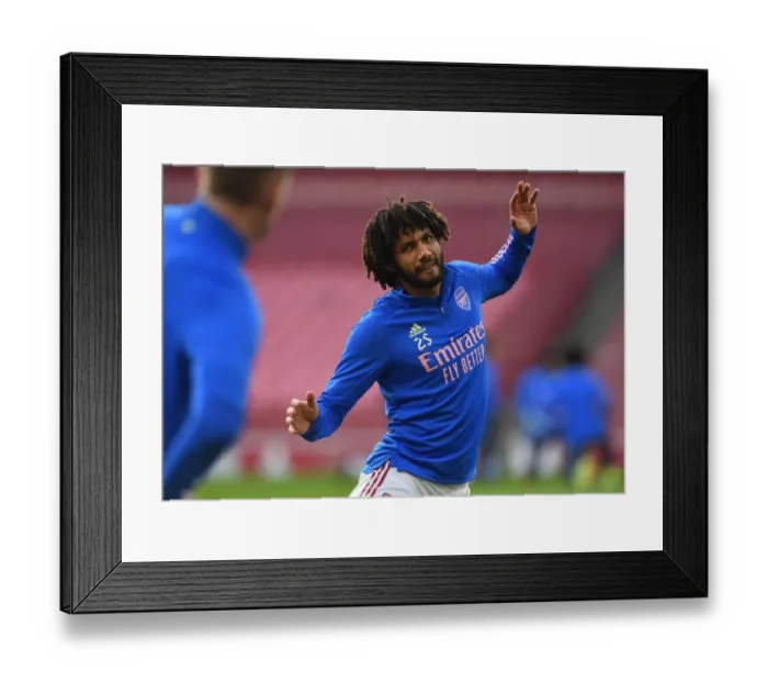 Framed Print : Arsenal v Manchester City: Elneny Warms Up Ahead of Empty Emirates Stadium Clash (2021)
