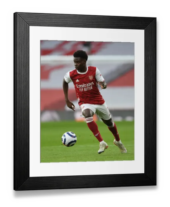 Framed Print : Behind Closed Doors: Bukayo Saka in Action for Arsenal Against Manchester City, Premier League 2021