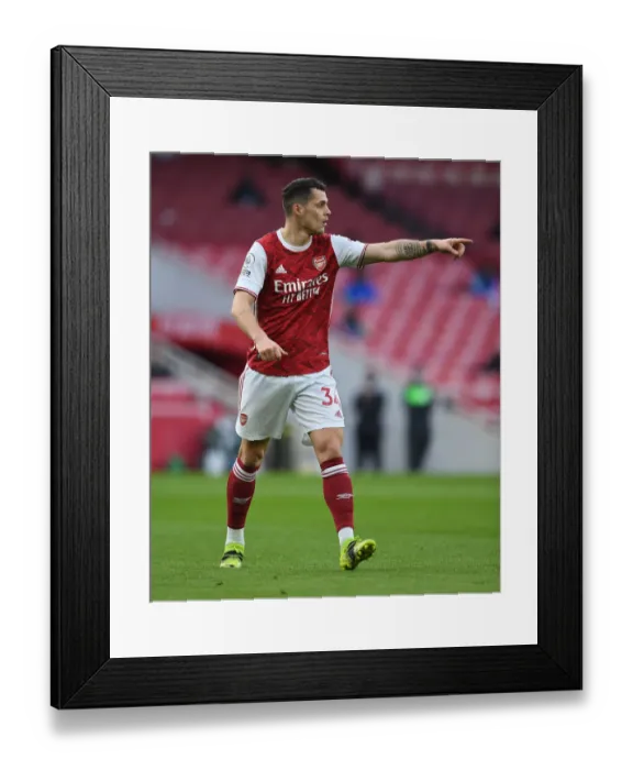 Framed Print : Arsenal's Granit Xhaka in Action Against Manchester City - Emirates Stadium, 2021 (Behind Closed Doors) Framed Print : Arsenal's Granit Xhaka in Action Against Manchester City - Emirates Stadium, 2021 (Behind Closed Doors)