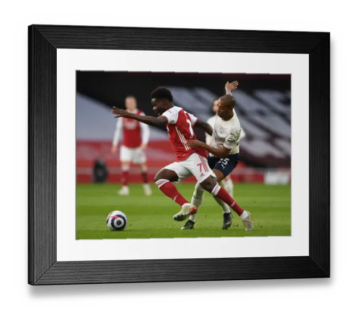 Framed Print : Battle at Empty Emirates: Saka vs Fernandinho - Arsenal vs Manchester City, Premier League 2020-21