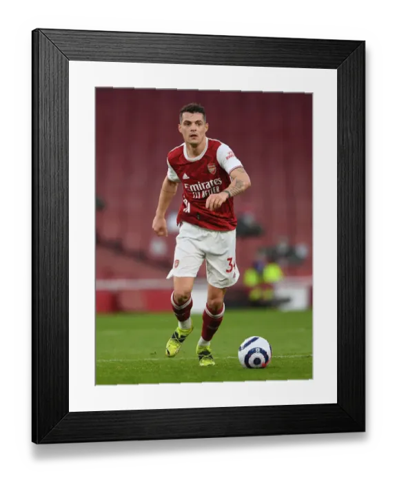 Framed Print : Arsenal's Granit Xhaka in Action: 2021 Premier League Match vs. Manchester City at Emirates Stadium (Behind Closed Doors) Framed Print : Arsenal's Granit Xhaka in Action: 2021 Premier League Match vs. Manchester City at Emirates Stadium (Behind Closed Doors)