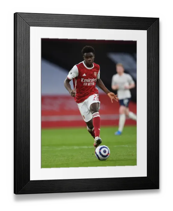 Framed Print : Arsenal's Bukayo Saka in Action: 2020-21 Premier League Match Against Manchester City (Behind Closed Doors)