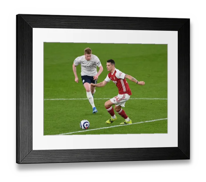 Framed Print : Clash of Titans: Xhaka vs. de Bruyne - Arsenal vs. Manchester City, Premier League 2021 Framed Print : Clash of Titans: Xhaka vs. de Bruyne - Arsenal vs. Manchester City, Premier League 2021